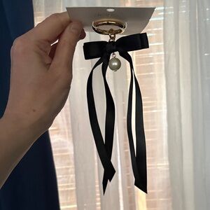J. Crew Bag charm with pearl and black bow